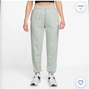 Nike girls size Large teal mint sweatpants joggers with draw string and pockets